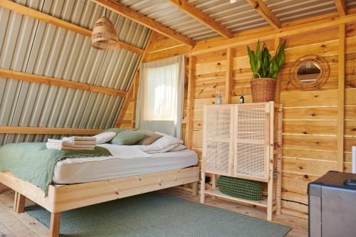 Ένα ή περισσότερα κρεβάτια σε δωμάτιο στο Tranquilo Glamping