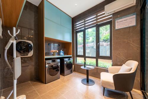 Istumisnurk majutusasutuses Country Inn & Suite by Radisson, Guangzhou Huadu Shiling