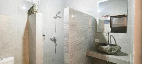 Koupelna v ubytování Mayka House