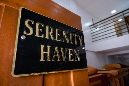 a sign on a door that reads eternity haveen at Hangout Haven Siargao Homestay in Dapa