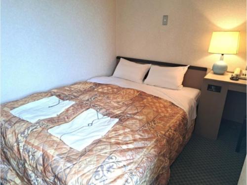 Postel nebo postele na pokoji v ubytování Hotel Tetora Higashimuroran - Vacation STAY 75838v