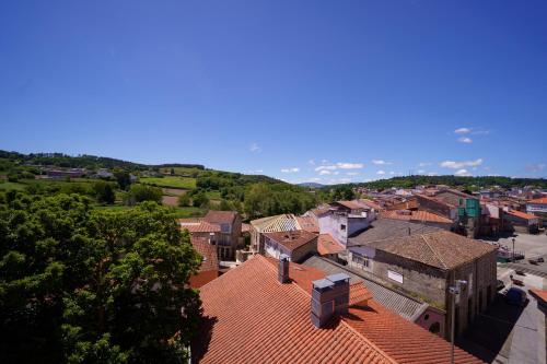 an overhead view of a town with roofs at Antoxos Sacra Home I in Chantada