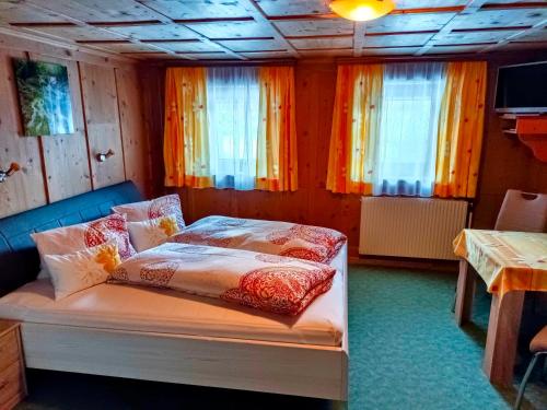 Una cama o camas en una habitación de Burgerhof