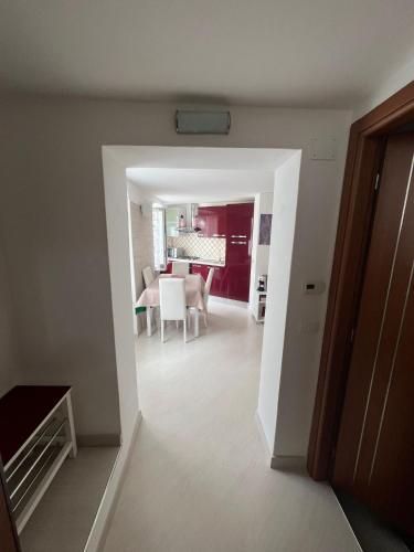 a view of a living room and a dining room at Casa Caia in Genoa