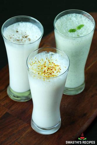 a group of three glasses of milk with nuts in them at Hotel Diamond in Bharatpur