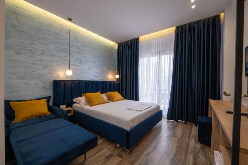 Cama o camas de una habitación en Hotel Flori