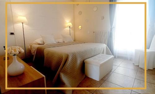 Ένα ή περισσότερα κρεβάτια σε δωμάτιο στο PUGLIA DISFIDA Apartment
