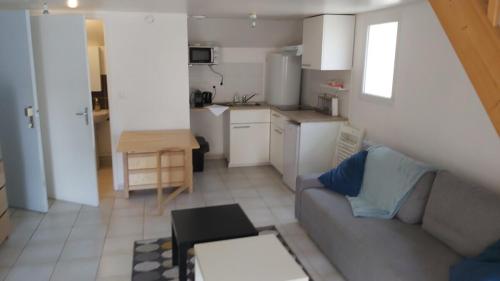 Η κουζίνα ή μικρή κουζίνα στο Appartement confortable et fonctionnel - Rickhoss Home