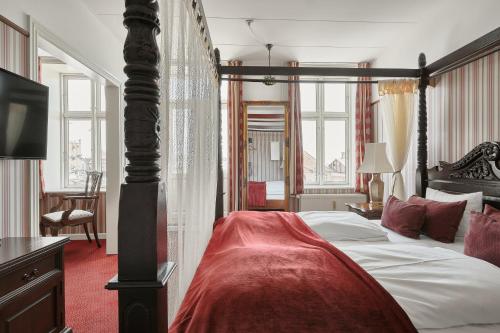 Postel nebo postele na pokoji v ubytování Hotel Ærø