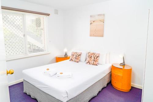 a bedroom with two beds and a window at Apartment 22 Burswood in Perth