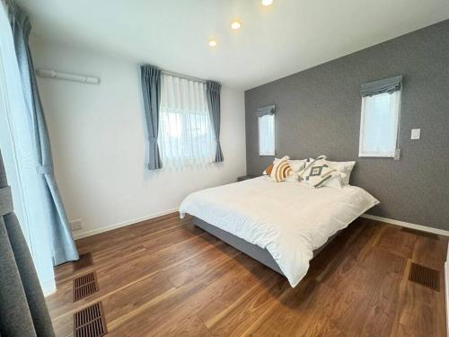 Cama o camas de una habitación en Akikawa Koshi 8