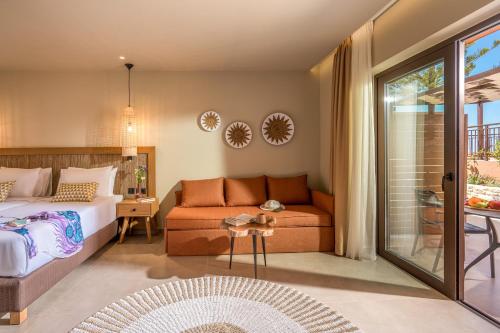 Ένα ή περισσότερα κρεβάτια σε δωμάτιο στο Hotel Pyriá