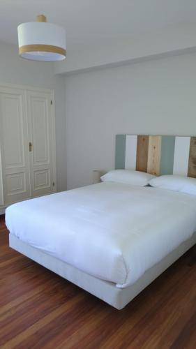 Postel nebo postele na pokoji v ubytování Casa das Indias