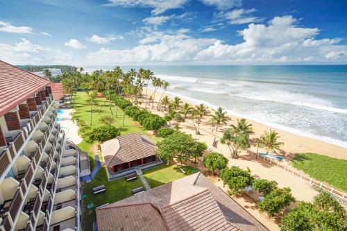 an aerial view of the beach at the resort at Turyaa Kalutara in Kalutara