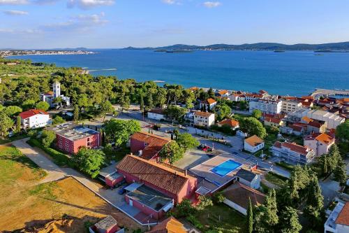 an aerial view of a small town by the water at Hotel Villa Donat in Sveti Filip i Jakov