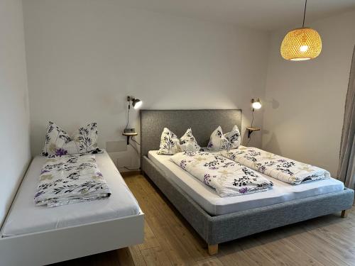 Postel nebo postele na pokoji v ubytování Dolomites Smart Holidays