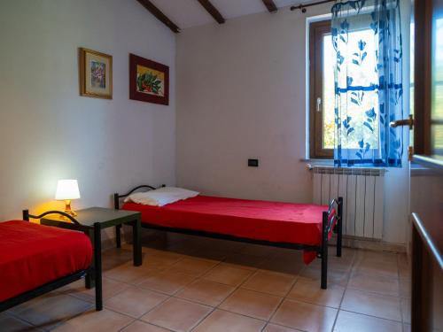 Ένα ή περισσότερα κρεβάτια σε δωμάτιο στο Holiday Home Breda by Interhome