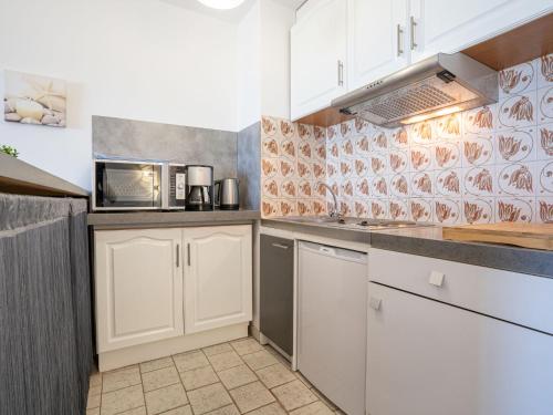 Kuchyň nebo kuchyňský kout v ubytování Apartment Dio Brasil-2 by Interhome