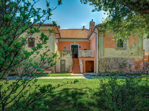 an exterior view of a house with a yard at Apartment Branko by Interhome in Sveti Juraj
