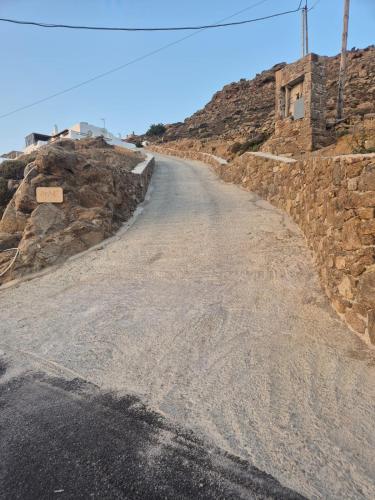 an empty road on the side of a mountain at ēnNĒ Studios for Views & Tranquility in Elia