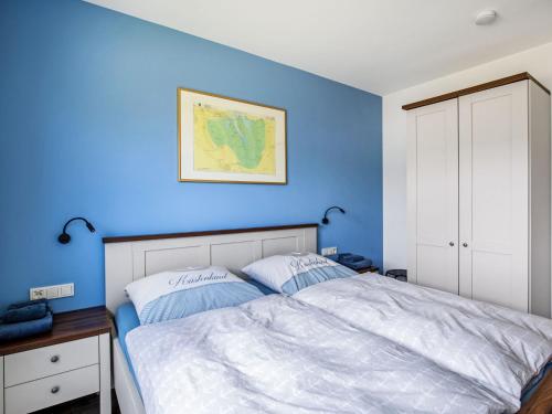 Katil atau katil-katil dalam bilik di Apartment Fischer sien Huus-1 by Interhome