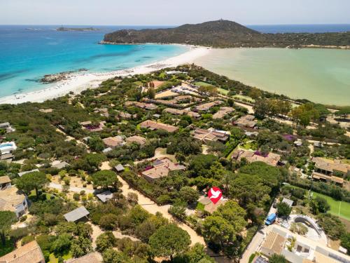 an aerial view of a resort with a beach at Villa La Casetta del Mare by Interhome in Villasimius