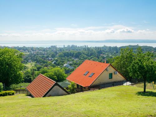 a house with an orange roof on top of a hill at Holiday Home Fokas - ABR123 by Interhome in Ábrahámhegy