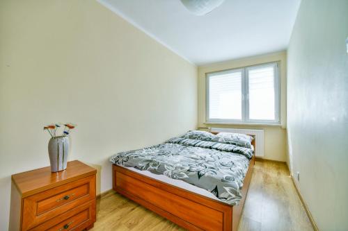 Posteľ alebo postele v izbe v ubytovaní Apartament u Joli w Kolobrzegu Podczele - 2 sypialnie, 50m2, wifi i parking za darmo!