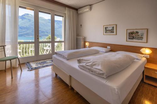 Katil atau katil-katil dalam bilik di Hotel Villa Margherita