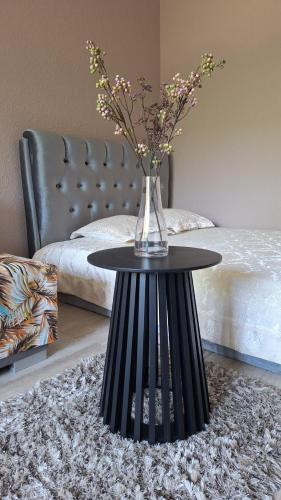 Apartamentai su balkonu