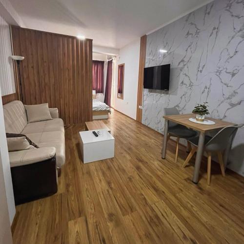 Μια τηλεόραση ή/και κέντρο ψυχαγωγίας στο SANA Apartments