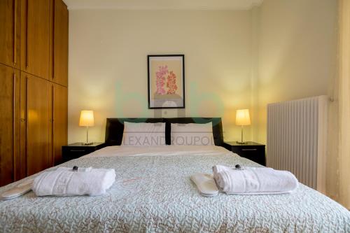 Ένα ή περισσότερα κρεβάτια σε δωμάτιο στο My AXD Apartment