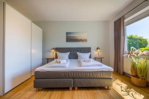 Ένα ή περισσότερα κρεβάτια σε δωμάτιο στο Villa Akasha