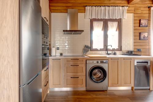 Kuchyň nebo kuchyňský kout v ubytování Arandas Village