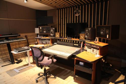 a recording studio with a desk and a keyboard at "La Rondinella" Salerno Amalfi Pontecagnano in Pontecagnano