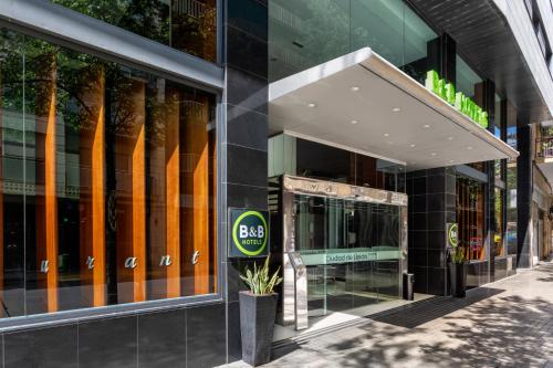 a store front of a building with a sign on it at B&B HOTEL Ciudad de Lleida in Lleida