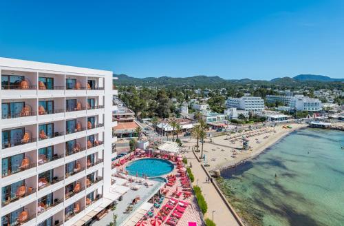 a view of a resort with a pool and a beach at NYX Hotel Ibiza by Leonardo Hotels-Adults Only in San Antonio Bay