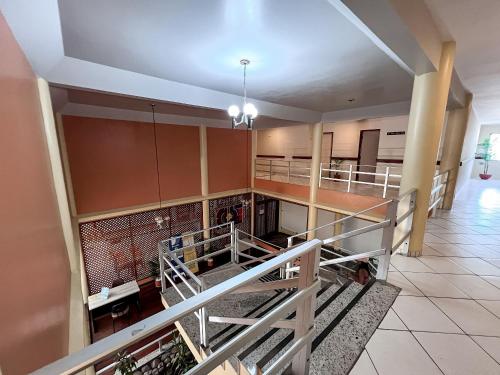 Gambar di galeri bagi Suiíte com ar condicionado, frigobar e mesa para trabalho. Localizada no Hotel Porto Belo Park, com parque aquático (sem custo para a utilização), quadras, academia, espaço kids, a aproximadamente 200 m praia de Taperapuã e do complexo Axé Mói. di Porto Seguro