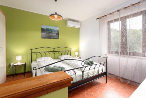 Postel nebo postele na pokoji v ubytování Studio Apartment
