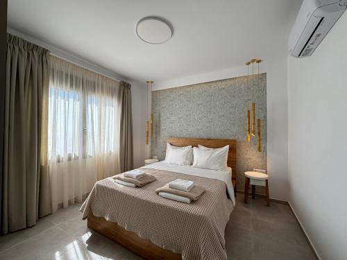 Postel nebo postele na pokoji v ubytování Ammokrinos Luxury Homes,150m from the beach