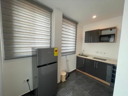 Kuchyň nebo kuchyňský kout v ubytování Mayama Residences
