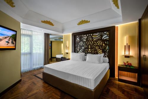 Un ou plusieurs lits dans un hébergement de l'établissement Prama Sanur Beach Bali