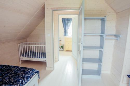 Postel nebo postele na pokoji v ubytování Fajne Miejsce Dębki