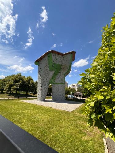 a statue of a letter z in a park at AMAO Obsidian - 120 m2 Business & Family Apartment - 3 Bedrooms - 8 Guests - King-Size Beds in Schwanau