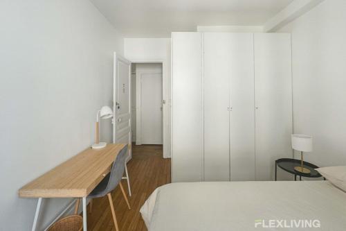 Postel nebo postele na pokoji v ubytování Flexliving - Room - Lamarck