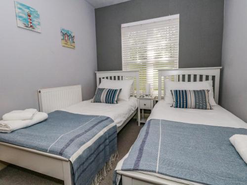 Voodi või voodid majutusasutuse The Lobster Pot toas