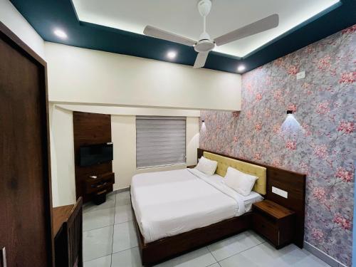 מיטה או מיטות בחדר ב-Kovilakam Achutham
