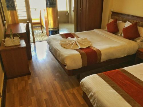 Postel nebo postele na pokoji v ubytování Trekkers Home