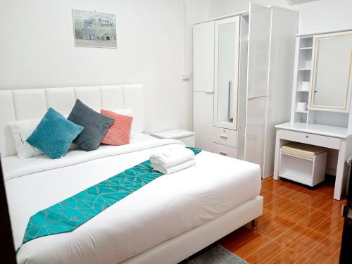 Postel nebo postele na pokoji v ubytování Pause Homestay 2 Hat Yai