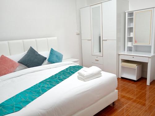 Postel nebo postele na pokoji v ubytování Pause Homestay 2 Hat Yai